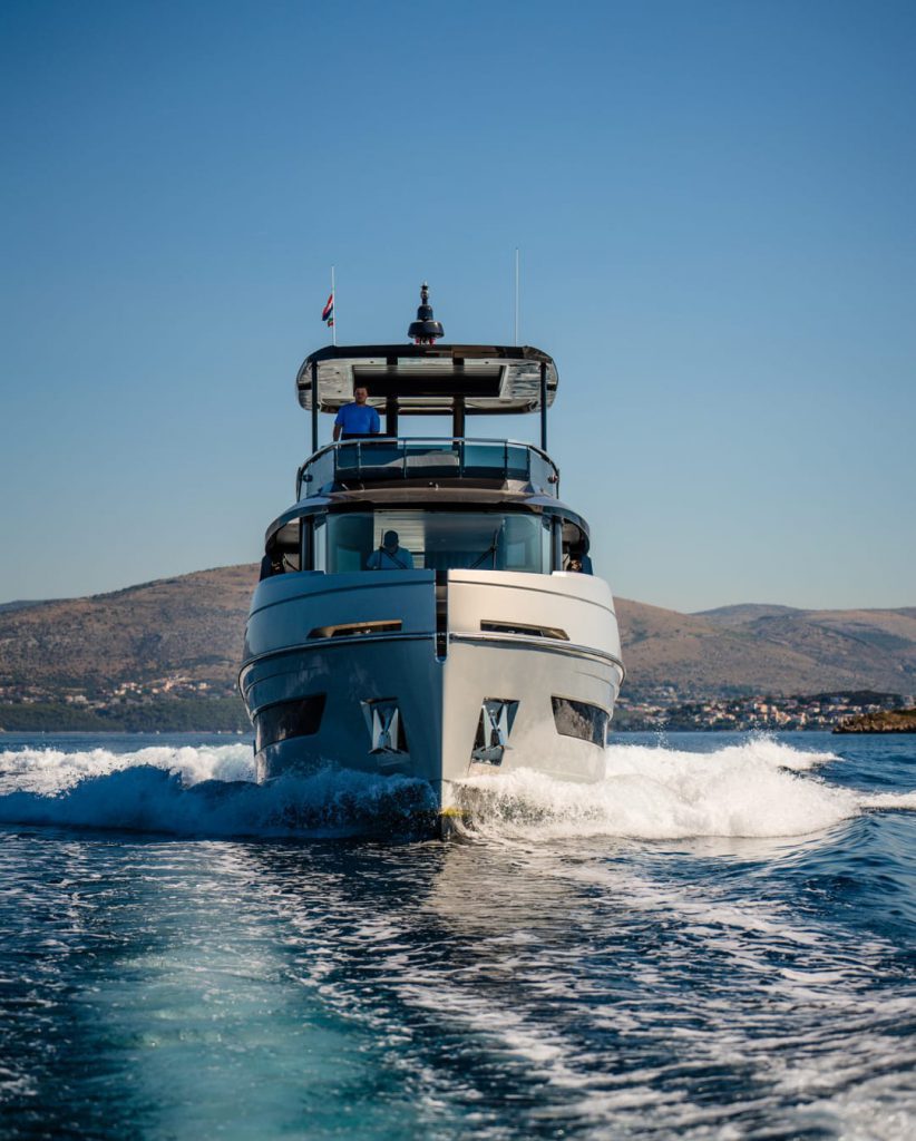 View of a boat on water facing the camera